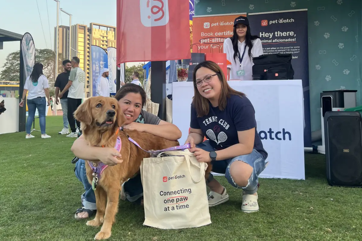 Pet Watch Stand at Pet Festival Abu Dhabi 2025 with happy pet parents Pet Watch Stand at Pet Festival Abu Dhabi 2025 with happy pet parents